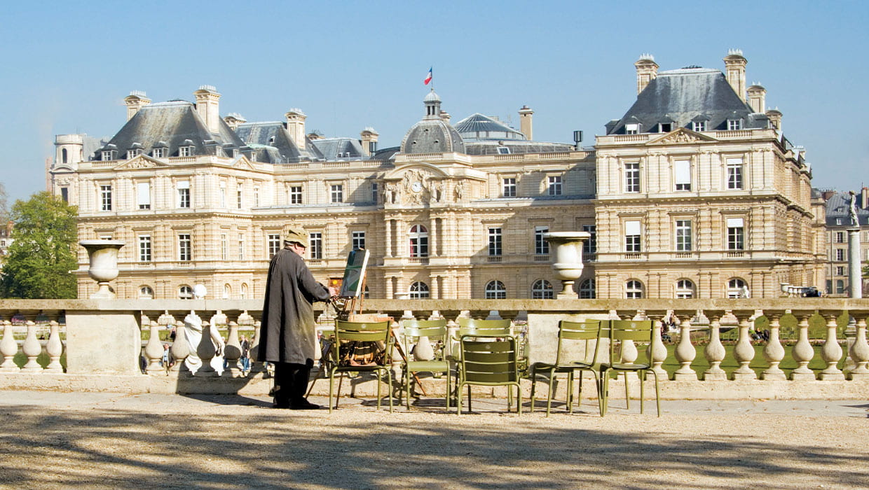 Man painting in Paris, France