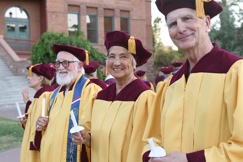 A group of Golden graduates on the Old Main lawn during Golden Circle induction ceremony.