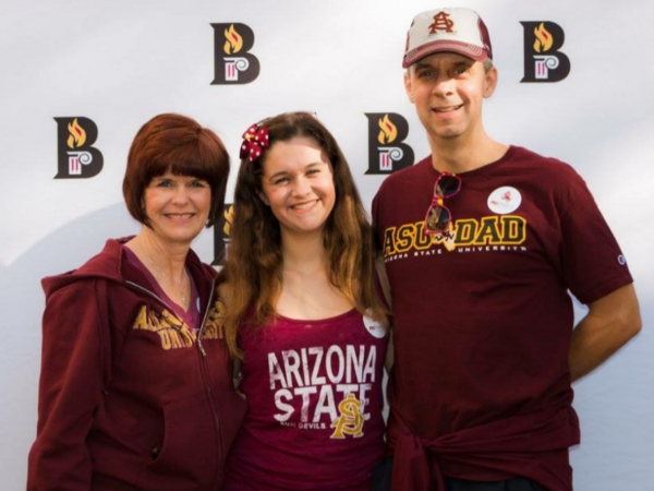 Young student with parents